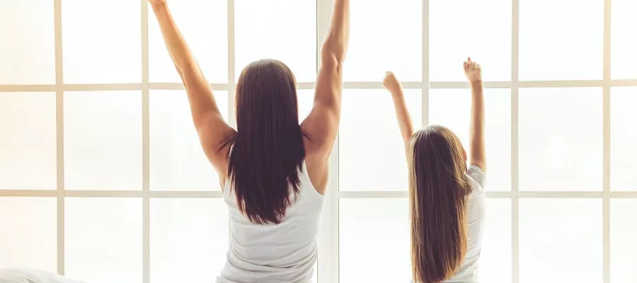 Mother and daughter stretching